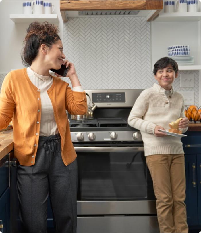 Conversation on the phone in kitchen